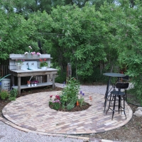 1707 Circular Brick Patio with Planter in Center
